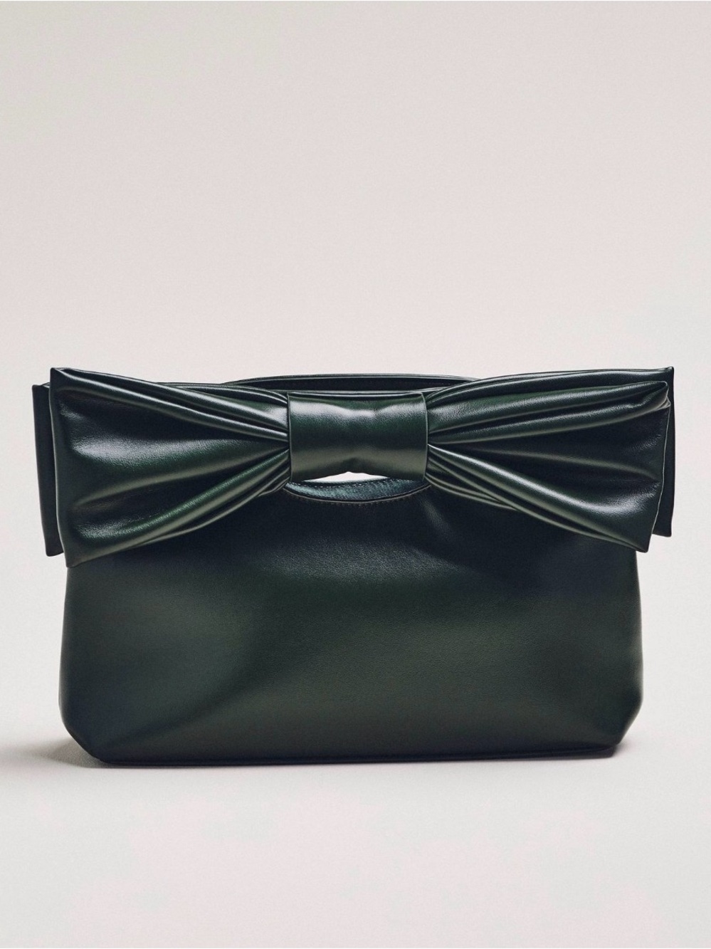 Anthropologie Cut Out Handle Bow Clutch in Green NWT